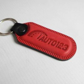 Breloki skrzane i gumowe z logo - referencje - Auto 123