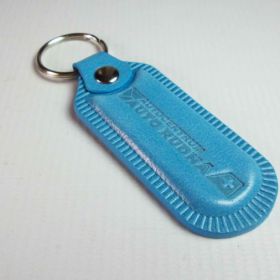 Breloki skrzane i gumowe z logo - referencje - Auto Rudn