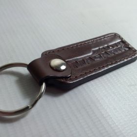 Breloki skrzane i gumowe z logo - referencje - Auto Masarik
