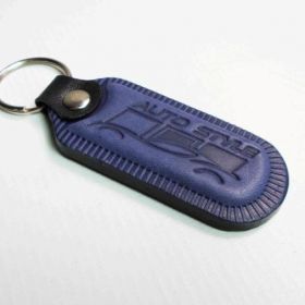 Breloki skrzane i gumowe z logo - referencje - Auto Style