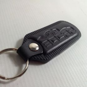 Breloki skrzane i gumowe z logo - referencje - Bocar