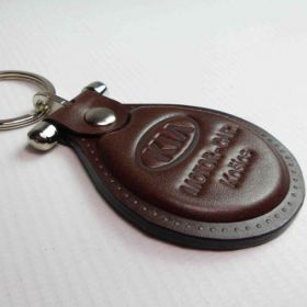 Breloki skrzane i gumowe z logo - referencje - Kia