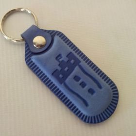 Breloki skrzane i gumowe z logo - referencje - Koen klenka