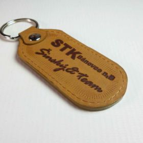 Breloki skrzane i gumowe z logo - referencje - STK