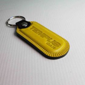 Breloki skrzane i gumowe z logo - referencje - Templus Car
