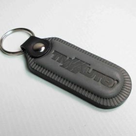 Breloki skrzane i gumowe z logo - referencje - TM - Auto